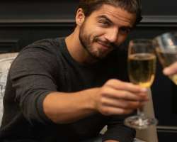 Maxi Iglesias consuming alcohol